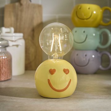 LED-Lampe mit Smiley-Sockel, gelb, 16 cm