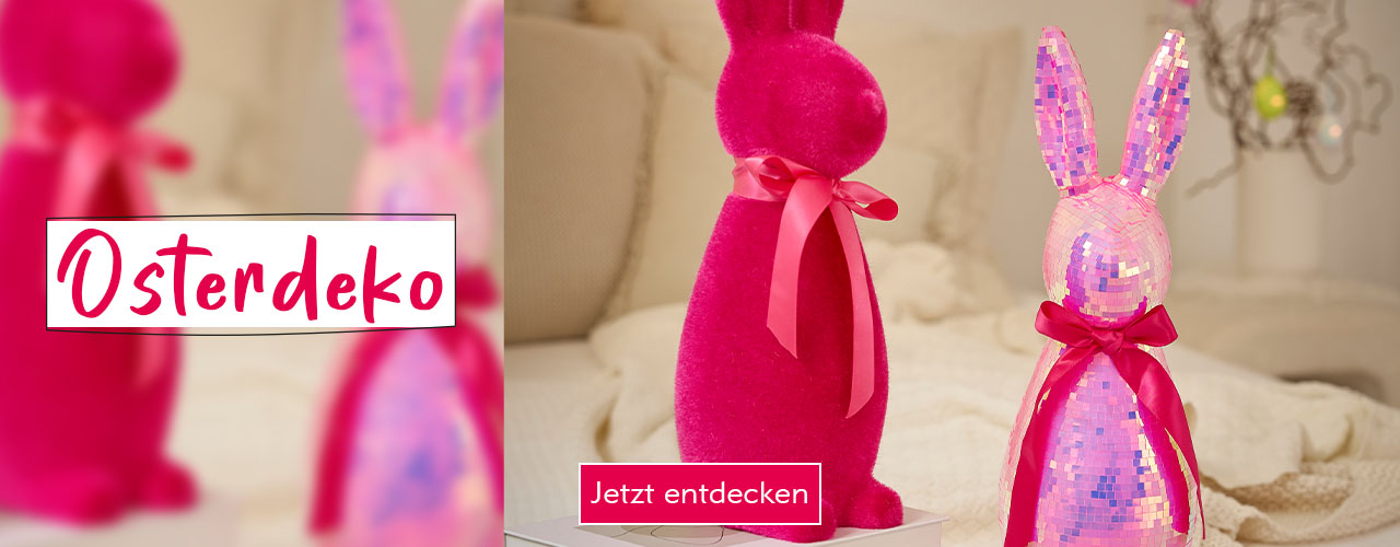 Zwei pinke Deko-Hasen mit Schleife verlinkt auf die Kategorie Osterdeko