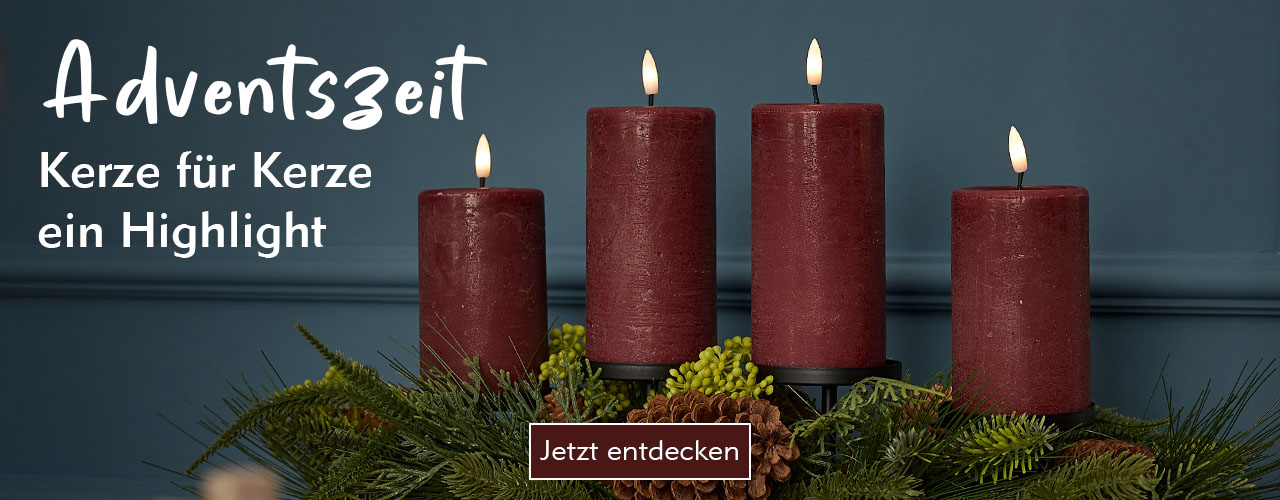 Adventsgesteck mit Tannengrün und roten LED-Kerzen verlinkt auf Adventskränze und Zubehör
