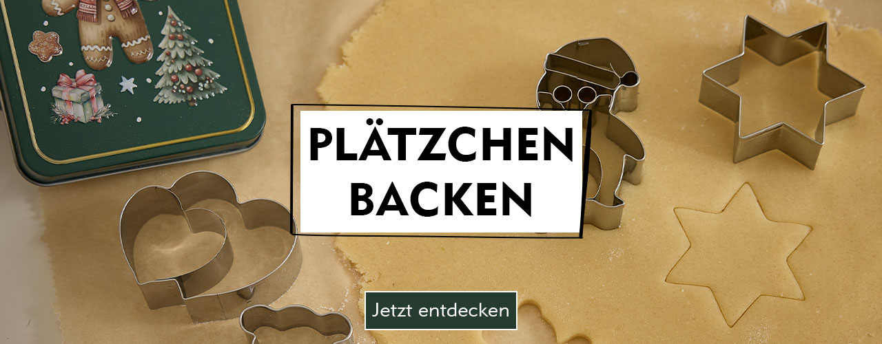 Entdecke weihnachtliches Backen bei Nanu-Nana Weihnachtliche Keksausstechformen auf rohem Teig verlinkt auf Keksdosen & Ausstechformen