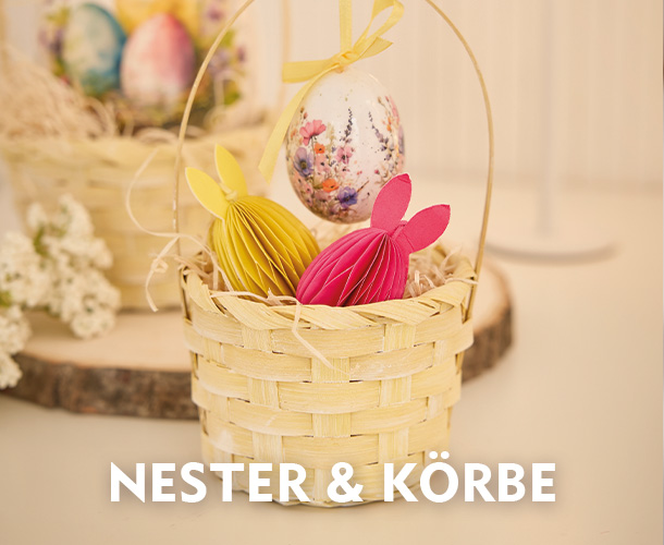 Gelber Dekokorb mit langem Henkel, gef&uuml;llt mit Osterhasen verlinkt auf die Kategorie Osternester